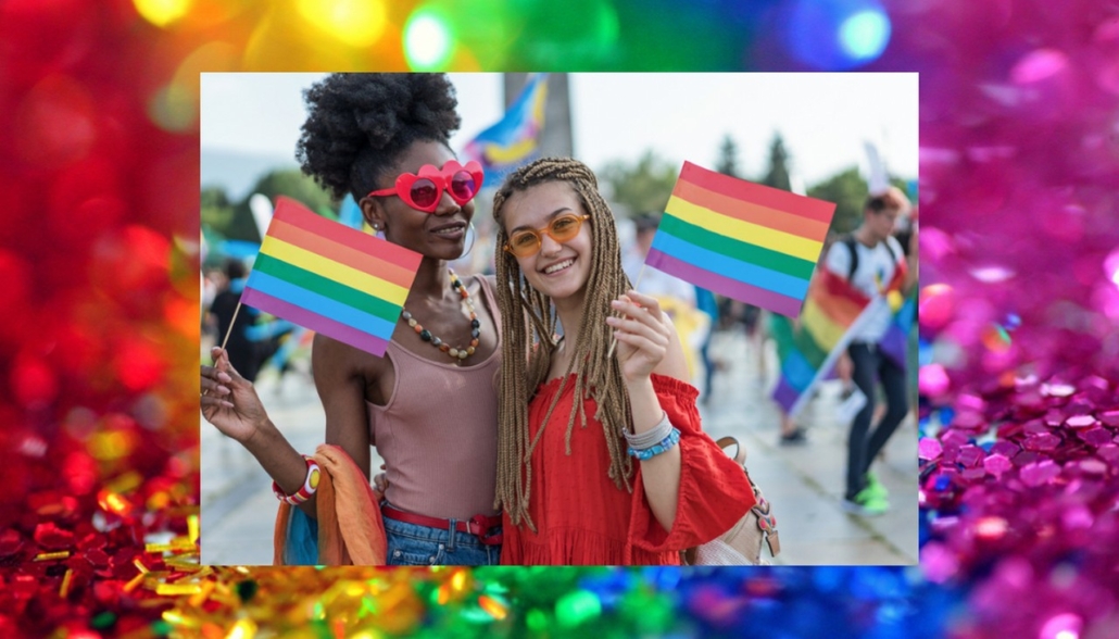Woman with pride flags in hand smiling together. Being in a supportive and safe environment matters for you. Why not begin LGBTQIA affirming therapy for support. Call now to work with an LGBTQ therapist today in LGBTQ counseling in Florida soon!