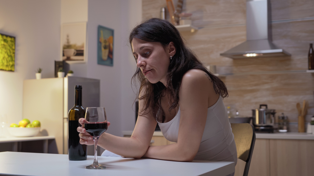 Woman with wine drinking to deal with work stress in Florida. Figuring out how to deal with stress at work can be difficult when it never ends. Talking with an online therapist may be a huge relief. Get in touch for stress therapy. Here you will learn skills to cope with stress. Get in touch soon!
