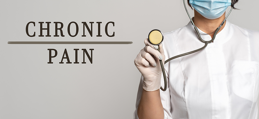 Doctor holding up stethoscope near chronic pain words. Looking for support when you're dealing with chronic pain isn't always straightforward. Let us help with coaching for chronic pain in Texas and Florida. Get fibromyalgia help, mast cell disease help, and help for migraines today!