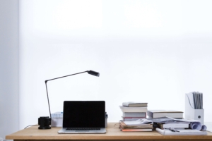 Desk with laptop and lamp. If you're a family struggling to connect and communicate, then therapy for families may be your next step. Let our family therapists help you better understand one another today. Begin family therapy in Brevard County, or via online therapy in Florida!