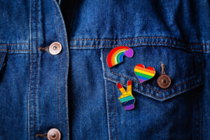 Jean jacket with rainbow pins. Get online therapy in Florida in a safe space. Begin LGBTQIA counseling in Florida and Brevard County, FL. When you're ready, our online therapists are here to provide space.