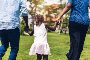 Family holding daughters hand. Are you struggling with outbursts, anger, and regulating your child? Getting ADHD support can help. Learn about ADHD treatment for children and gain some helpful ADHD parenting skills in Florida soon!