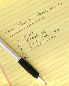 A close up of a new years list that reads diet, exercise, quit smoking, drink less. Learn how online therapy in Florida can offer support in the new year by searching for an online therapist in Brevard County, FL today. 