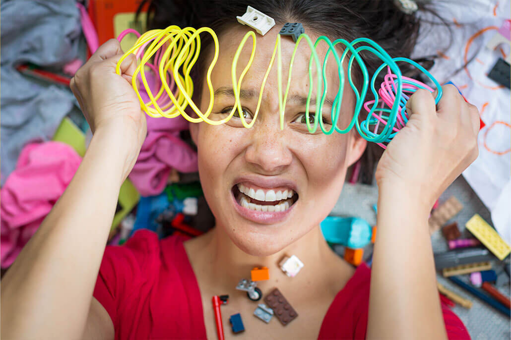 Stressed Woman Pulling a Plastic Slinky. Anxiety can manifest in the mind and body in many ways. Get help with anxiety therapy in Florida. Work with caring anxiety therapists and experience relief.