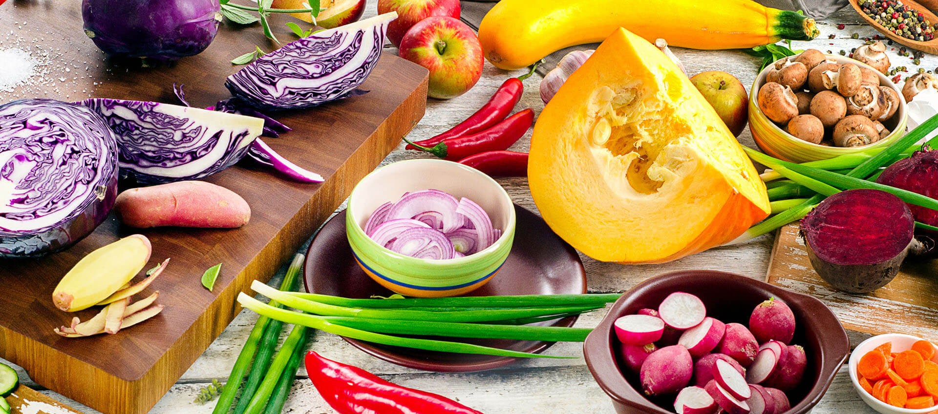 Vibrant healthy foods spread out on a table.