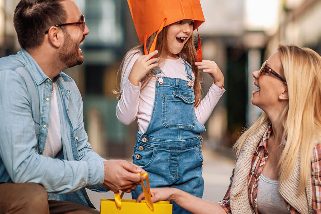 Happy family taking a break from shopping. Family is complicated and making sure you’re able to connect matters. Our family therapists can help you. Try family therapy in Brevard County, FL today and begin finding peace. We also offer family based treatment for individuals and families overcoming eating disorders.