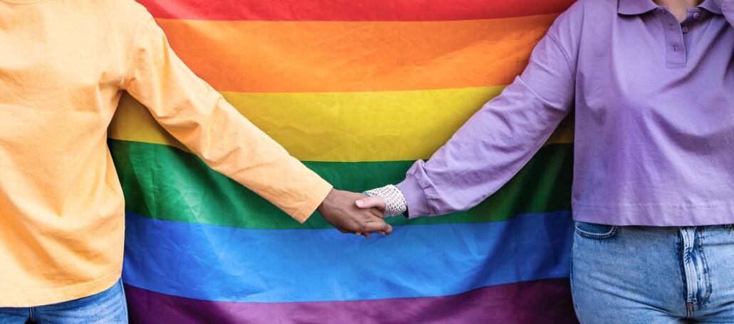 LGBTQ couple holding hands, Be who you are. Inside an out of mental health therapy. Begin working with an lgbtq therapist to help you be your authentic self. Begin lgbtq counseling today!