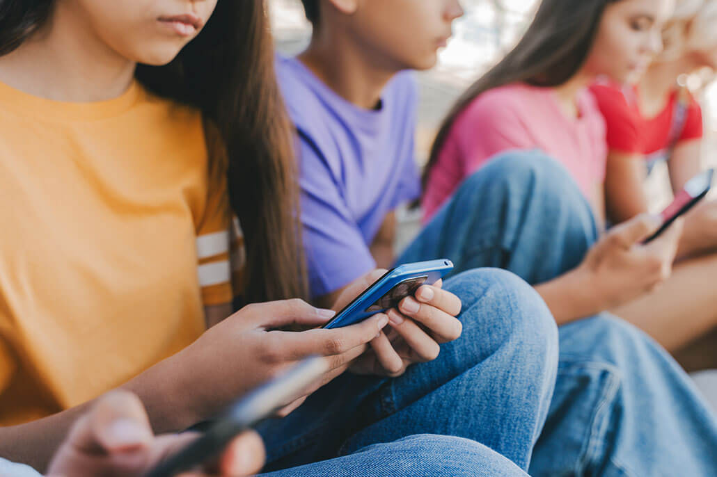 Group of teens sitting together | The teens years can be challenging for the family. Get your teen support from a gender affirming therapist or teen therapist who gets it. In therapy for teens in Brevard County, FL we can help with identity issues in adolescents, self-harm, addictions, and more. Call now!