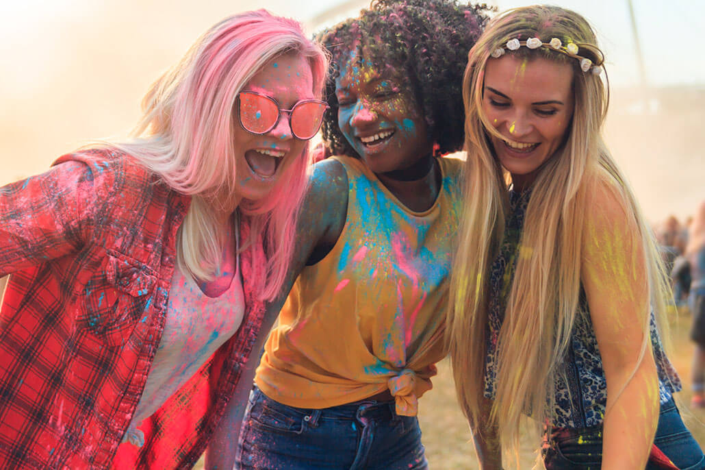 Group paint splattered young women. Let’s see how you can grow in therapy for young adults in florida. Call now and begin LGBTQIA therapy, anxiety treatment, or eating disorder treatment, see how online therapy can help!