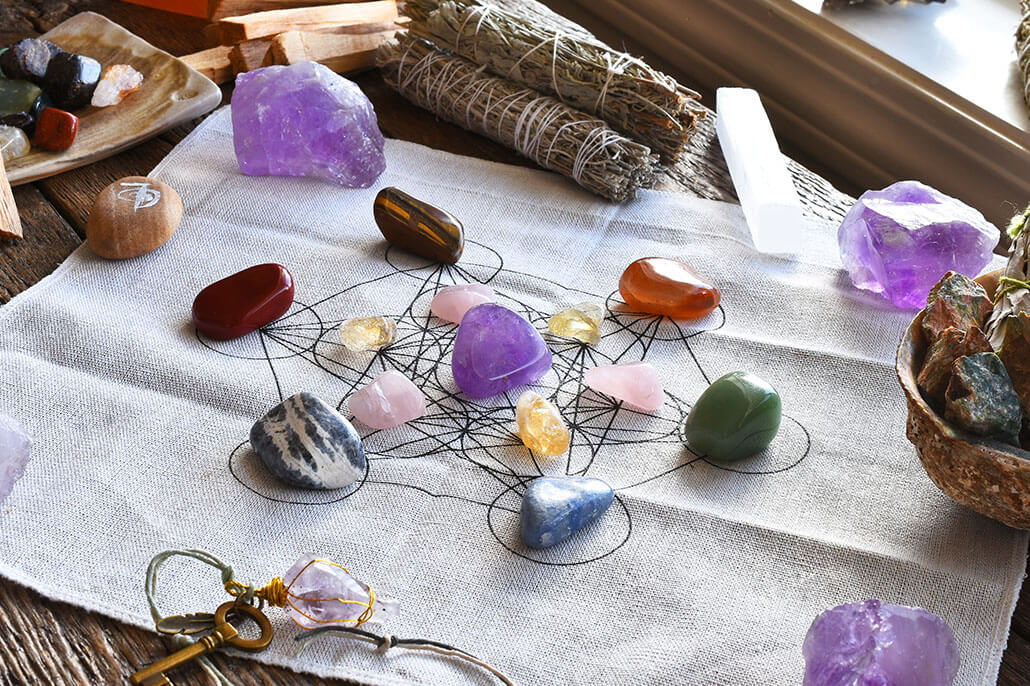 Reiki healing crystals sitting within a six pointed star